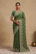 Green Organza Silk Saree with Embroidery on the body and Embroidery Border. Includes unstitched blouse.