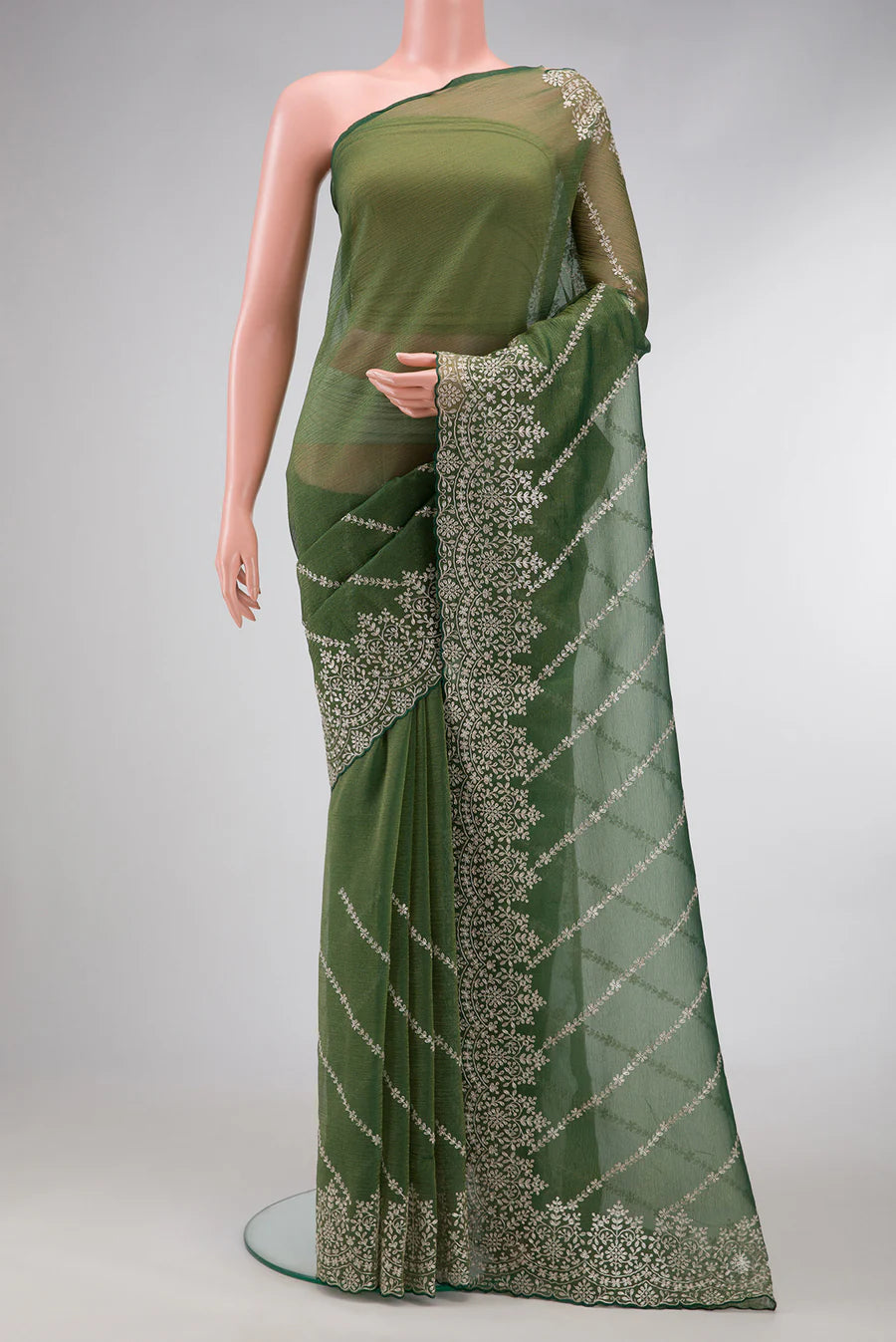 Green Organza Silk Saree with Embroidery on the body and Embroidery Border. Includes unstitched blouse.